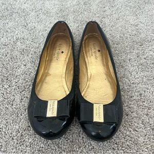 Black patent bow ballet flats by Kate Spade New York